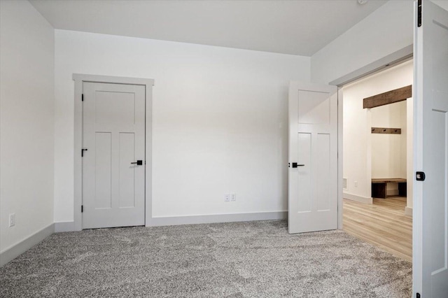 unfurnished room featuring carpet floors