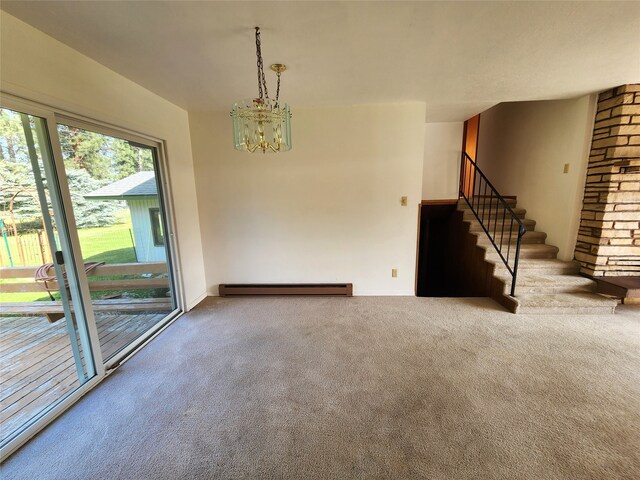 carpeted empty room featuring stairs, a baseboard radiator, and an inviting chandelier