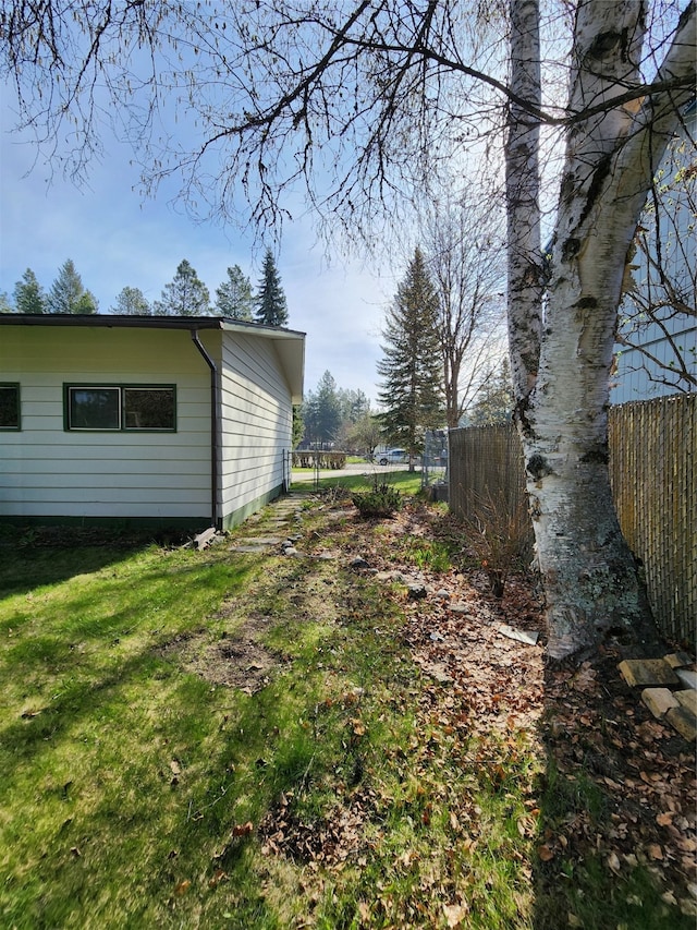 view of yard with fence