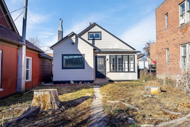 735 Placer St, Butte, MT 59701 - view of front of house with a chimney