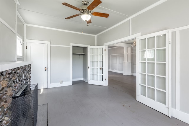 unfurnished living room featuring ornamental molding, hardwood / wood-style flooring, and ceiling fan