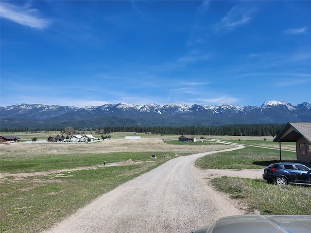 view of road featuring a mountain view and a rural view