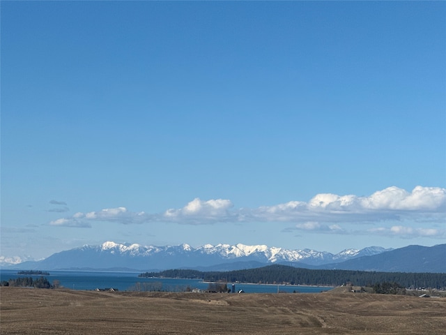 view of mountain feature featuring a water view