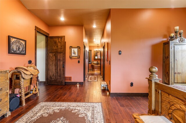 hall featuring dark hardwood / wood-style floors