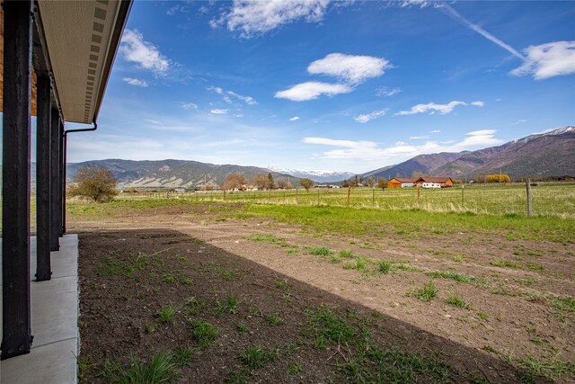 property view of mountains featuring a rural view