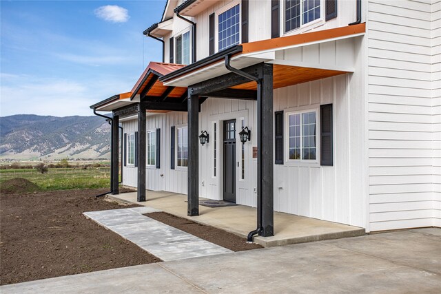 doorway to property featuring a mountain view