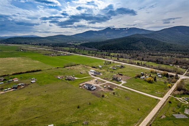 aerial view featuring a mountain view and a rural view