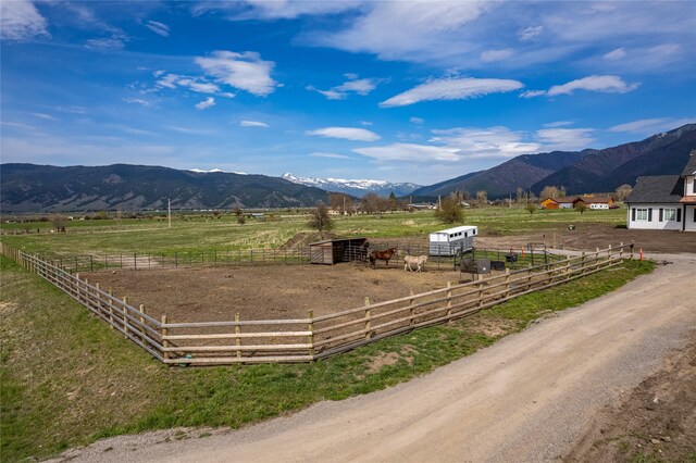 view of mountain feature with a rural view