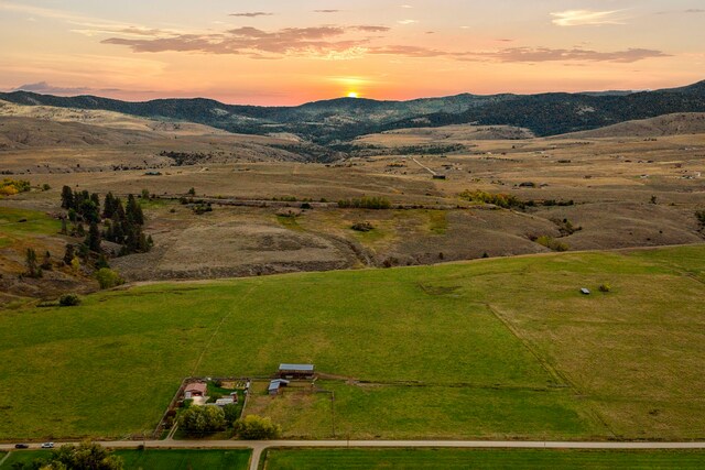 1848 Mountain View Orchard Rd, Corvallis, MT 59828 - aerial view at dusk of a rural view and a mountain view