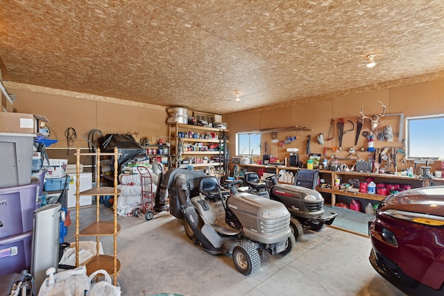 garage with a workshop area