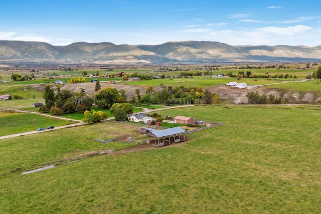 aerial view featuring a mountain view and a rural view