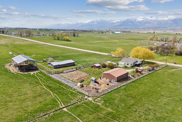 aerial view featuring a mountain view and a rural view