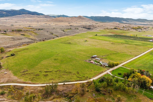 bird's eye view featuring a mountain view and a rural view