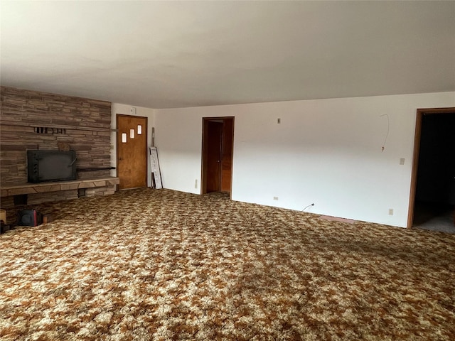 unfurnished living room with a fireplace