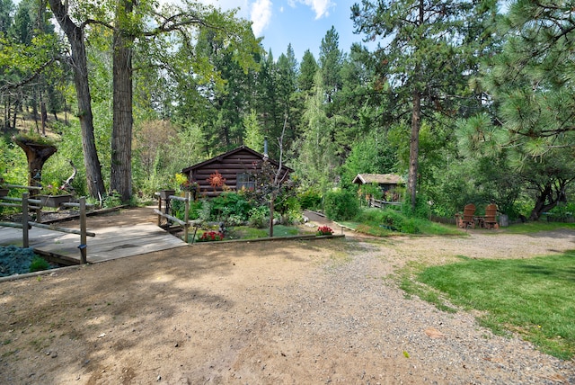 view of yard with a wooden deck