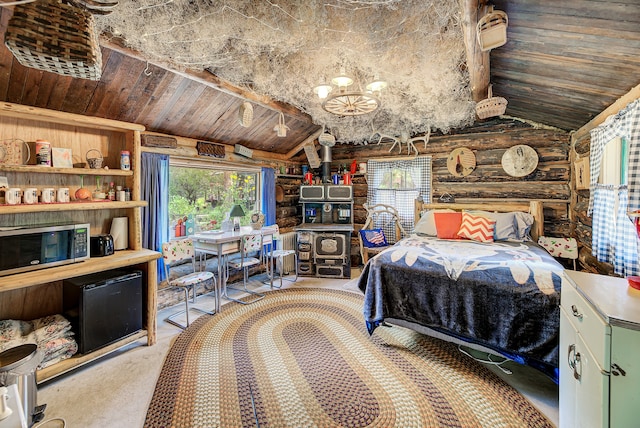 bedroom featuring vaulted ceiling and wooden ceiling