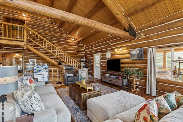 living room featuring high vaulted ceiling, hardwood / wood-style floors, beamed ceiling, and wood ceiling