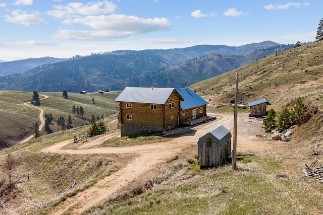 bird's eye view with a rural view and a mountain view