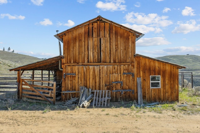 view of outdoor structure with a mountain view