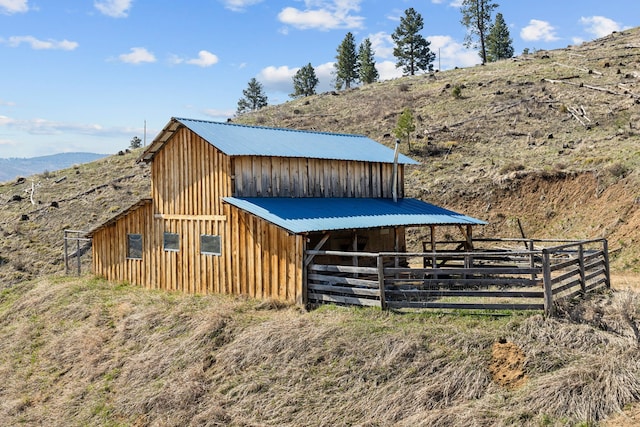 view of outdoor structure with a mountain view