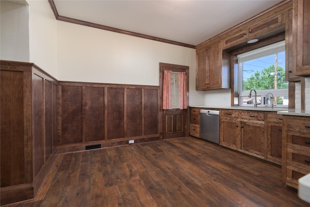 522 Hickory St, Anaconda, MT 59711 - kitchen featuring stainless steel dishwasher, crown molding, dark wood-style floors, wainscoting, and light countertops