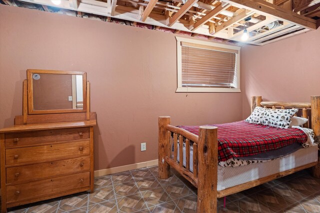 bedroom featuring baseboards