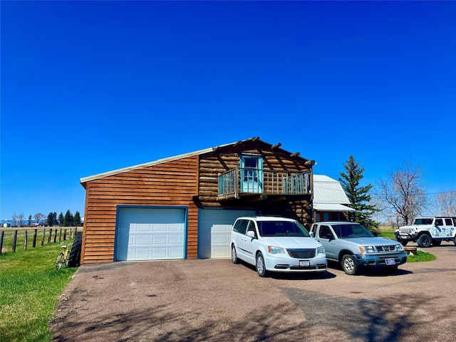 630 18th Rd NW, Choteau, MT 59422 - view of front of home featuring aphalt driveway and fence
