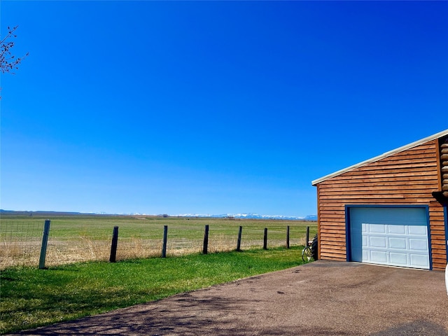 630 18th Rd NW, Choteau, MT 59422 - exterior space with a rural view, driveway, and fence
