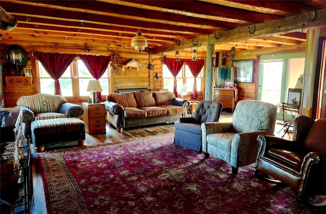 630 18th Rd NW, Choteau, MT 59422 - living room with wood finished floors and beam ceiling