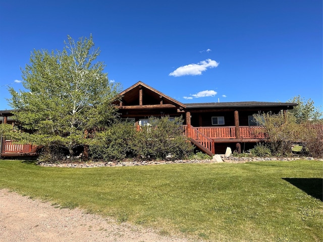 102 W Clark St, Philipsburg, MT 59858 - rear view of house featuring a yard