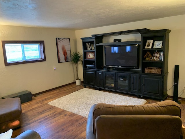 102 W Clark St, Philipsburg, MT 59858 - living room with baseboards and wood finished floors