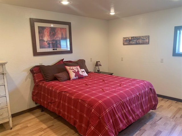 102 W Clark St, Philipsburg, MT 59858 - bedroom featuring recessed lighting, wood finished floors, and baseboards