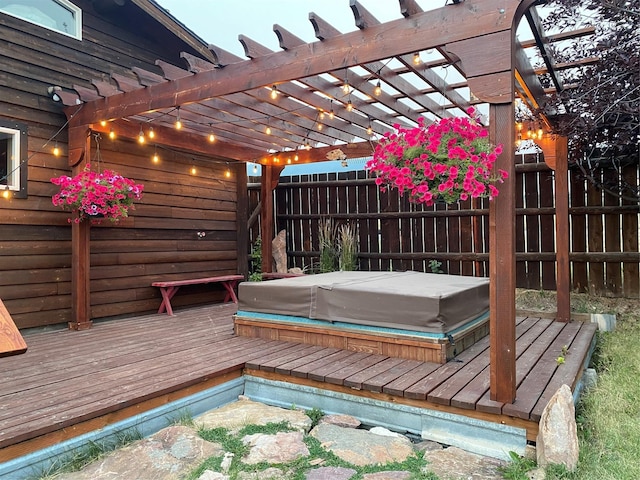 102 W Clark St, Philipsburg, MT 59858 - wooden terrace featuring a pergola, a covered hot tub, and fence