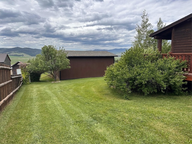 102 W Clark St, Philipsburg, MT 59858 - view of yard featuring a mountain view and fence