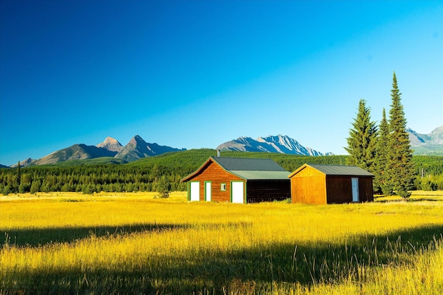 400 Kintla Ranch Rd, Polebridge, MT 59928 - view of mountain backdrop