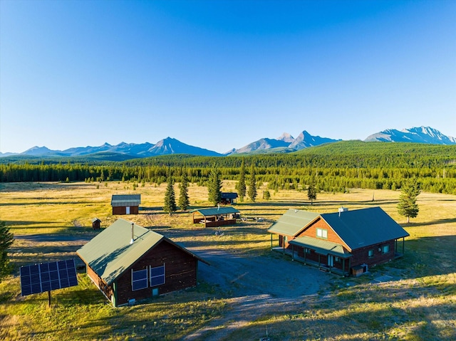 400 Kintla Ranch Rd, Polebridge, MT 59928 - overview of rural landscape with a mountain backdrop