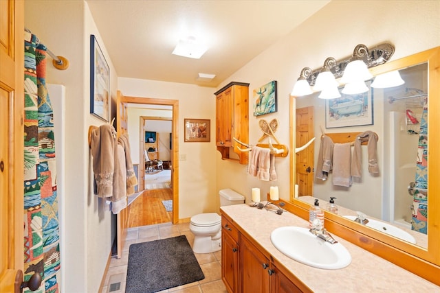 400 Kintla Ranch Rd, Polebridge, MT 59928 - full bath with tile patterned floors, vanity, and a shower with curtain