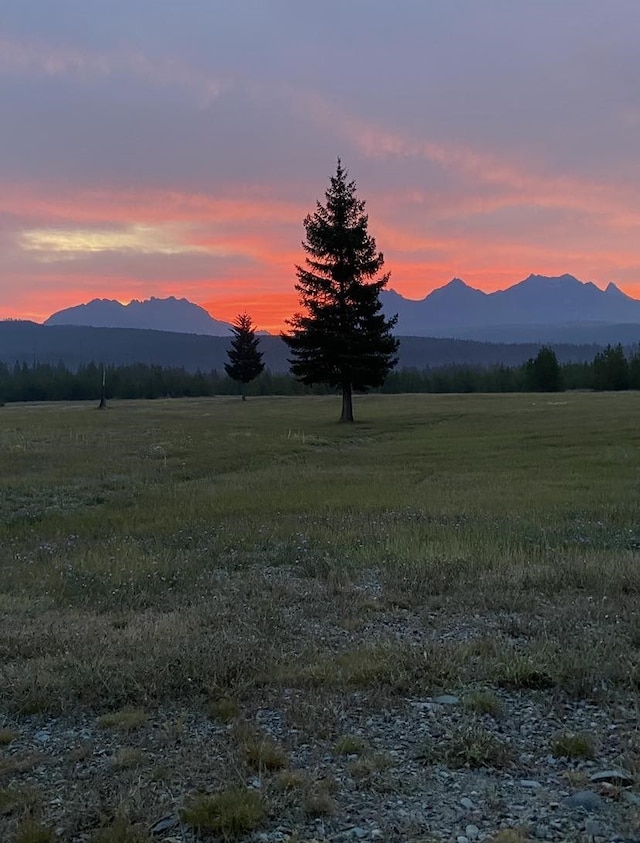 400 Kintla Ranch Rd, Polebridge, MT 59928 - view of mountain background with rural landscape