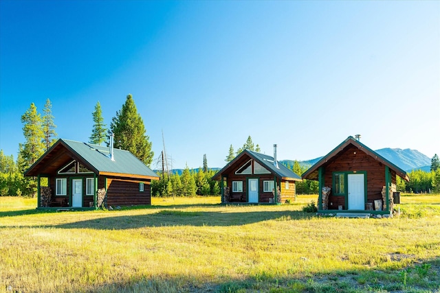 400 Kintla Ranch Rd, Polebridge, MT 59928 - view of grassy yard with an outdoor structure
