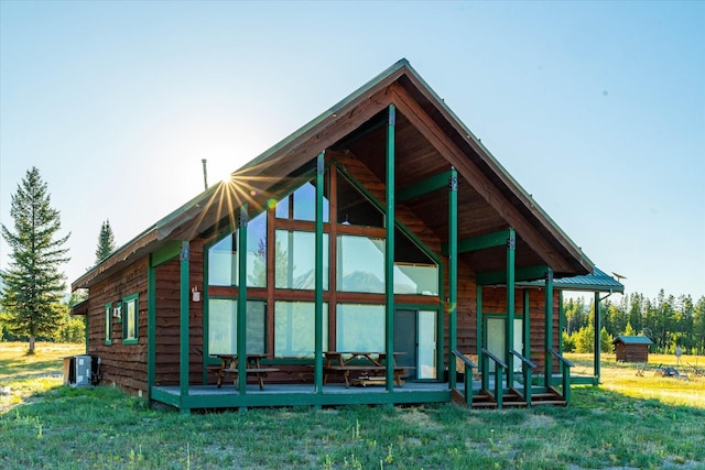 400 Kintla Ranch Rd, Polebridge, MT 59928 - rear view of property with a yard