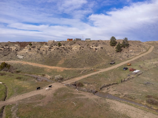 view of mountain feature with a rural view