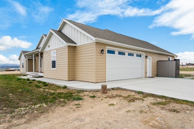 view of property exterior with a garage