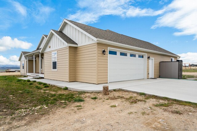 view of property exterior with a garage