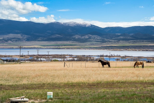 mountain view with a water view and a rural view