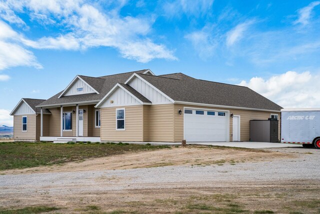 view of front of property with a garage