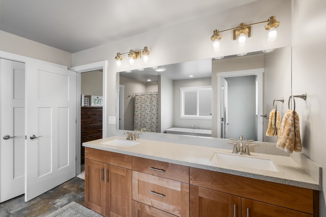 bathroom with vanity and curtained shower