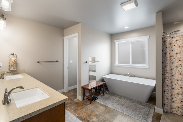 bathroom featuring vanity and plus walk in shower