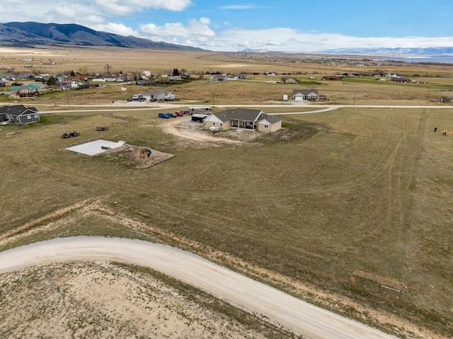 bird's eye view with a mountain view and a rural view