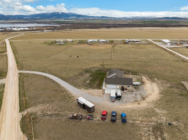 drone / aerial view with a rural view and a mountain view