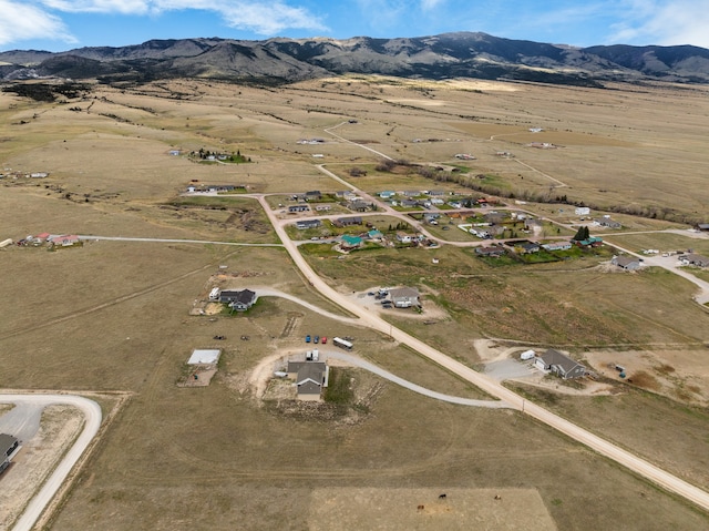 drone / aerial view featuring a mountain view